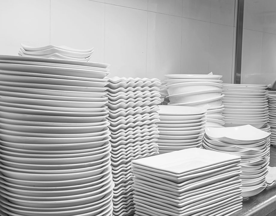 Stack of Cleaned Dishes in a Restaurant Room