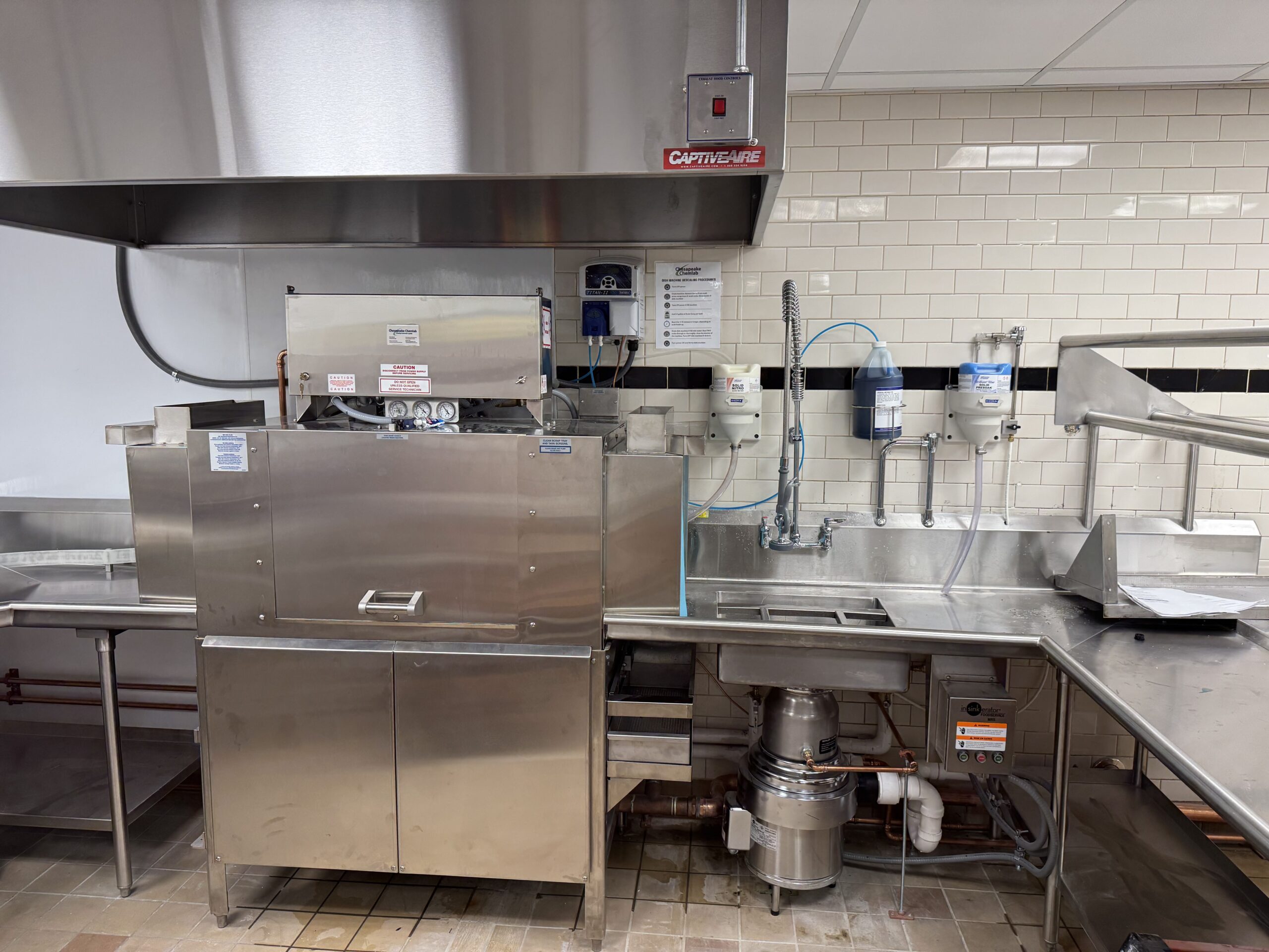 commercial dishwasher installed in kitchen